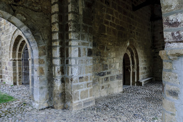 Fototapeta premium sight of the entry of the Romanesque collegiate church of San Salvador in Cantamuda in Palencia, Castile and León, Spain