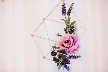 interesting construction with purple flowers for decoration