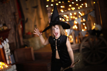 Obraz premium crazy Girl witch with broom . childhood Halloween