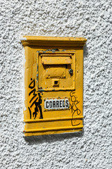 yellow letterbox in historic center of las palmas, gran canaria