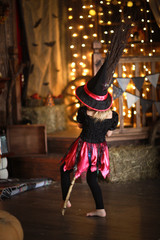  Girl witch with  broom dancing. childhood Halloween