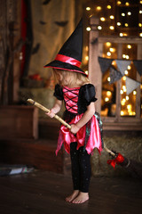  Girl witch with  broom dancing. childhood Halloween