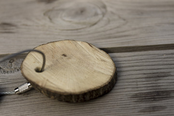 wooden key chain on table