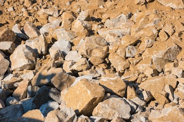 Rock slide area: pile of fallen rocks (boulders) covering the ground