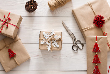 Wrapped boxes of christmas holiday present with craft twine