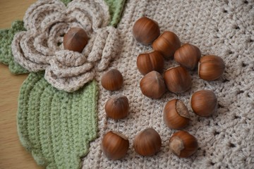 nuts on a knitted crochet product