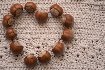 nuts on a knitted crochet product