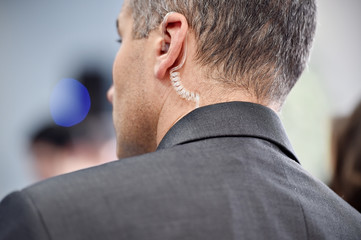 Fototapeta premium Bodyguard with in ear headset