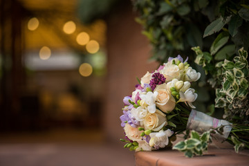 Wedding bouquet with freesia and roses