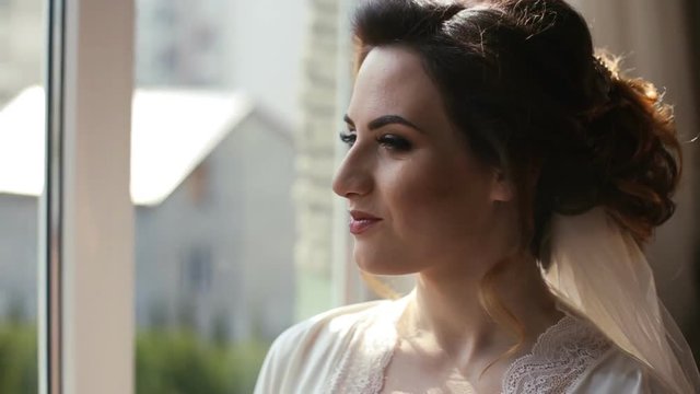 Pretty bride smiling on her wedding day