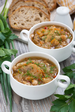 soup with cabbage, mushrooms and chickpeas, vertical
