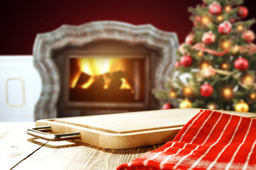 wooden table place and xmas tree 