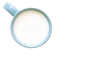 Top view of glass milk blue and white in simple glass. Isolated on white background. Round copy space in center.
