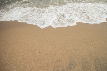 Fototapeta na wymiar Wave on the beach