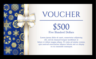 Luxury Christmas voucher with golden snowflakes on blue background and with white ribbon