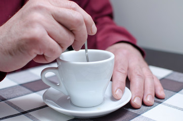 tea cup in man's hands