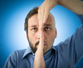 Conceptual two sides face portait photo of a man