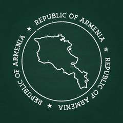 White chalk texture rubber seal with Republic of Armenia map on a green blackboard. Grunge rubber seal with country outlines, vector illustration.