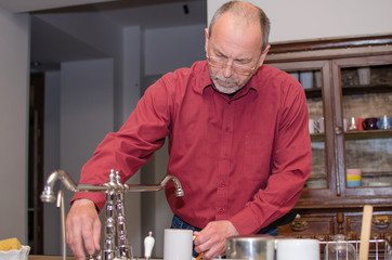  man washing the dishes