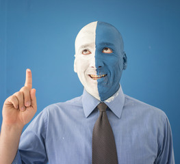 Blue and white face portait photo of a man