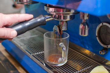 Aged man making coffee