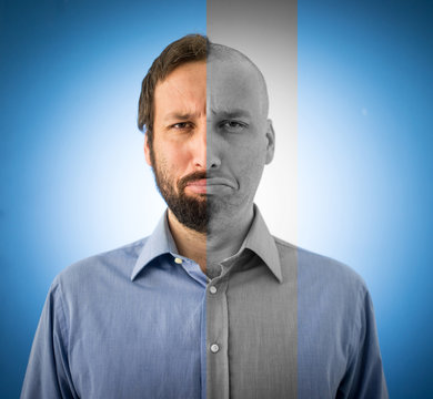 Conceptual two sides face portait photo of a man