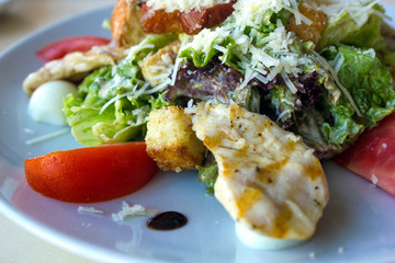 caesar salad on the plate