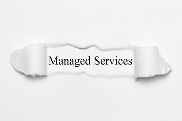 Managed Services on white torn paper