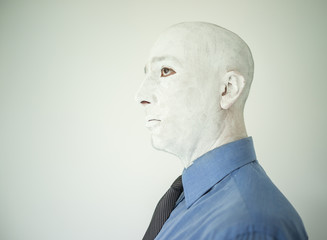 Artistic painting man face in white