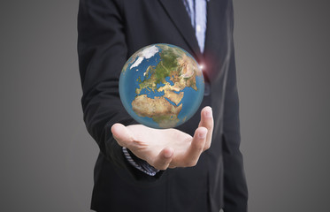 business hand holding globe earth concept business social. Elements of this image furnished by NASA