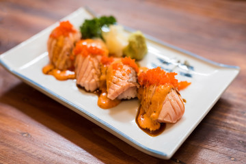 Grilled or burned salmon sushi
