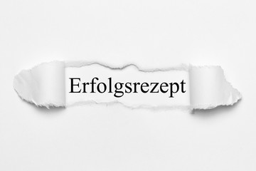 Erfolgsrezept auf weißen gerissenen Papier