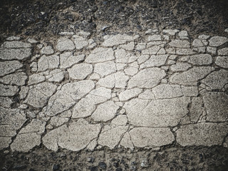 Cracked asphalt road surface background/ Color filter effect 