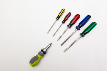 colorful screwdrivers on white backgrounds