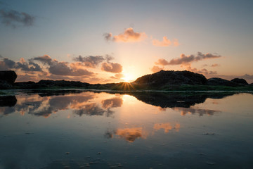 Fototapeta na wymiar Sunset at Sennen Cove beach, Cornwall, England