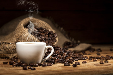 Coffee beans on wooden background