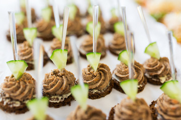 close up of canape with paste on serving tray