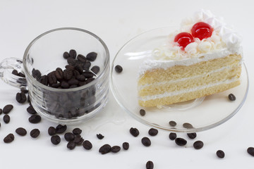 coffee beans and white cake on table