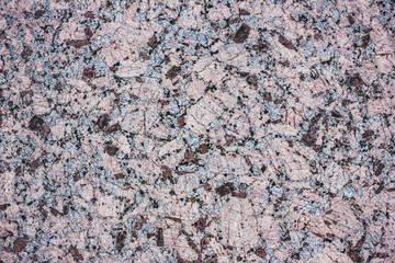 Red granite mineral flat surface texture.