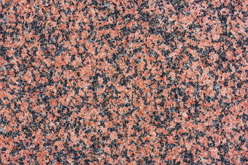 Red granite mineral flat surface texture.