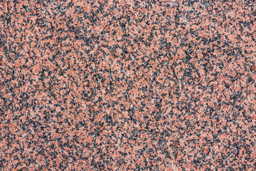 Red granite mineral flat surface texture.