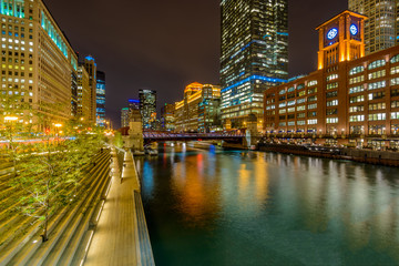 Fototapeta na wymiar Chicago River skyline with urban skyscrapers at night, IL, USA