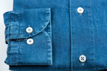 details of blue jeans shirt