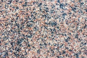 Red granite mineral flat surface texture.