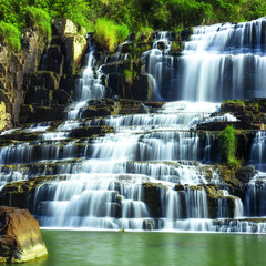 Tropical rainforest landscape with flowing Pongour waterfall. Da Lat, Vietnam