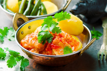 Poached Fish in Tomato Sauce