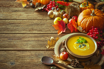 Thanksgiving autumn background with pumpkin soup
