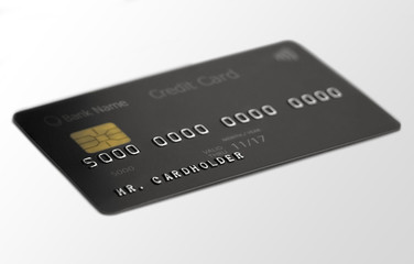 Black credit bank card on white background, depth of field, cardholder name