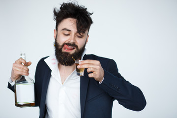 Young man with beard is drunk