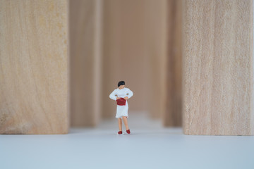 Miniature people infront of entrance